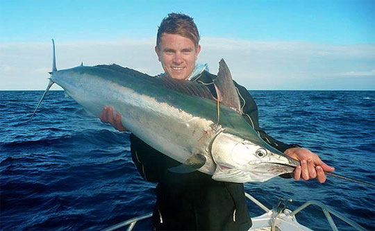 Daniel Mathieson and a Cape Bowling Green Black marlin